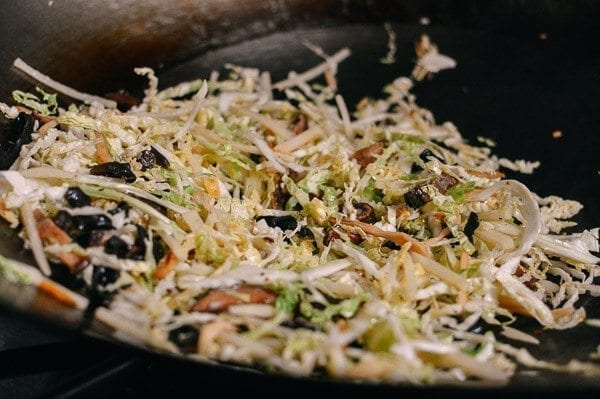 Stir-frying shredded cabbage, mushrooms, and lily flowers for moo shu by cwww5.fioekdjsdas.cf