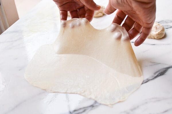 lifting thin oiled dough, by cwww5.fioekdjsdas.cf