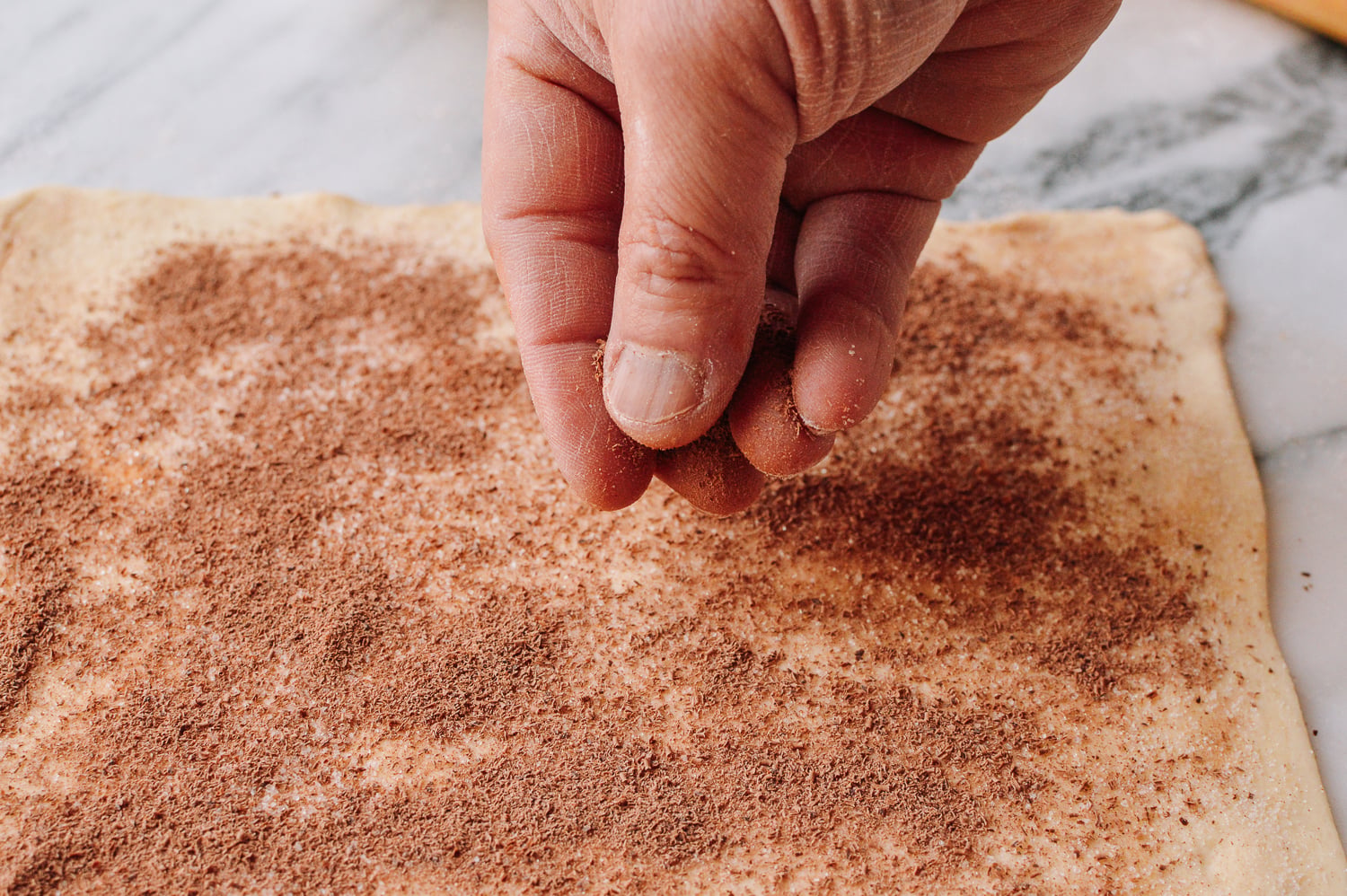 Spreading grated chocolate over puff pastry, cwww5.fioekdjsdas.cf