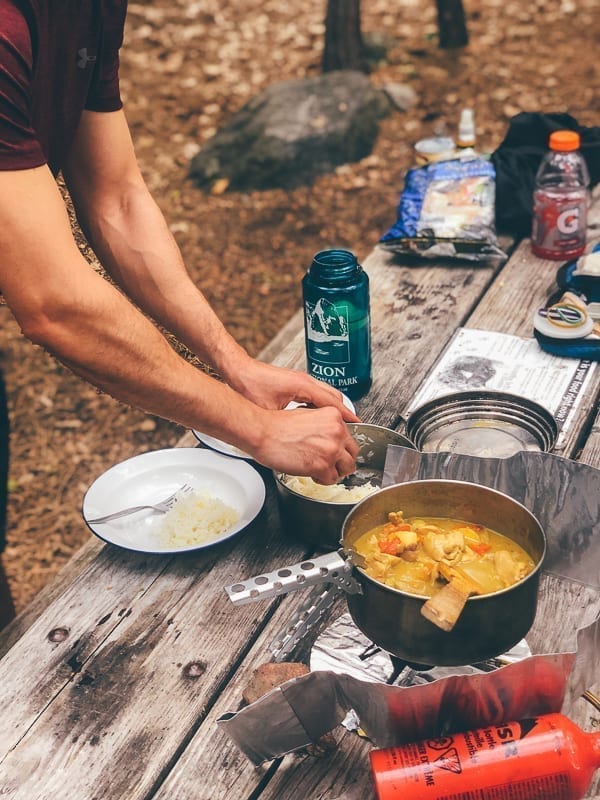 Cooking chicken curry over camping stove, cwww5.fioekdjsdas.cf