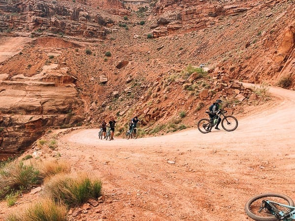 Mountain bikers walking on Schafer trail on White Rim trail Moab Utah by cwww5.fioekdjsdas.cf