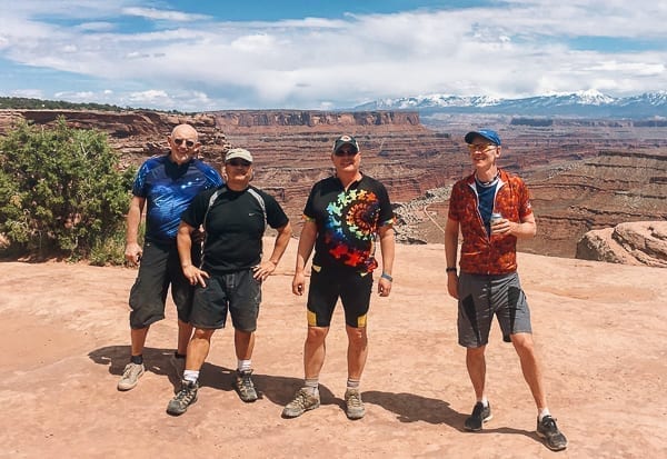 Mountain bikers group photo at top of Schafer trail on White Rim trail Moab Utah by cwww5.fioekdjsdas.cf