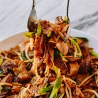 Serving beef chow fun noodles, cwww5.fioekdjsdas.cf