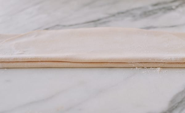 Layered noodle dough ready for cutting, cwww5.fioekdjsdas.cf