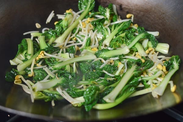 Ruyi cai being stir-fried in a wok, cwww5.fioekdjsdas.cf