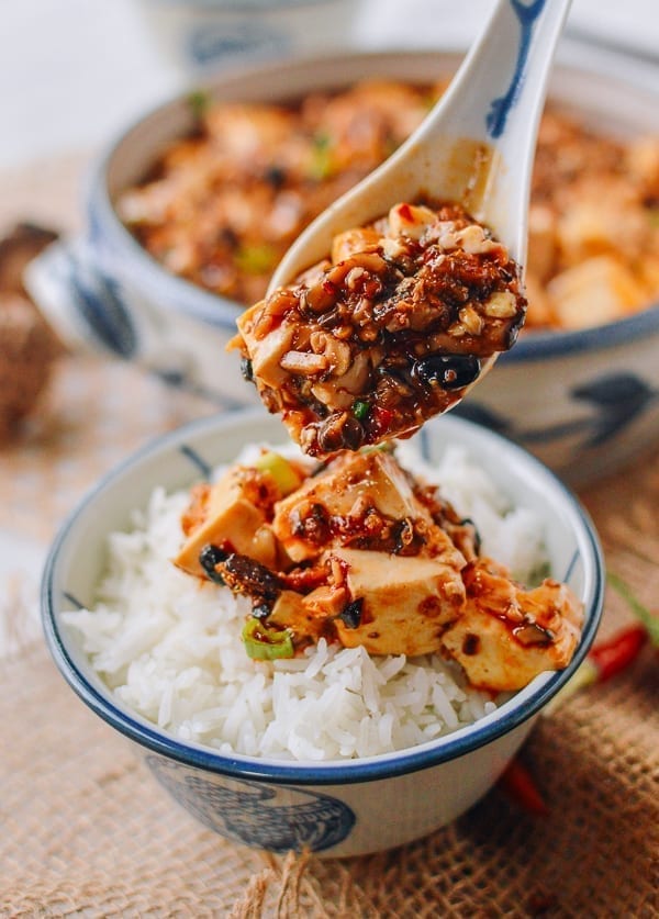 Spooning vegan mapo tofu over rice, cwww5.fioekdjsdas.cf