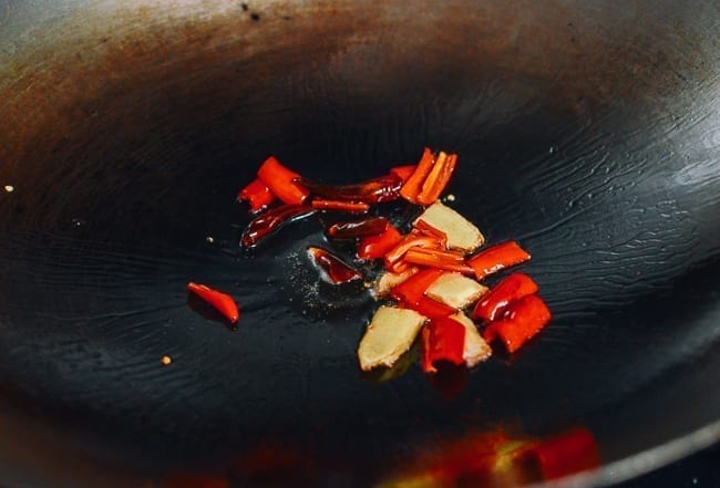 Adding red peppers to wok, cwww5.fioekdjsdas.cf