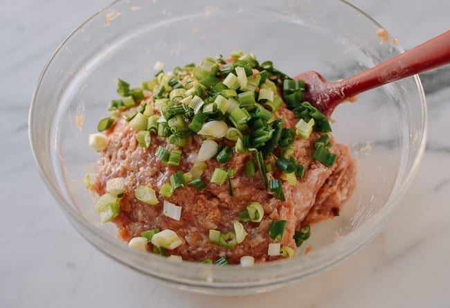 Stirring scallions into meat mixture, cwww5.fioekdjsdas.cf