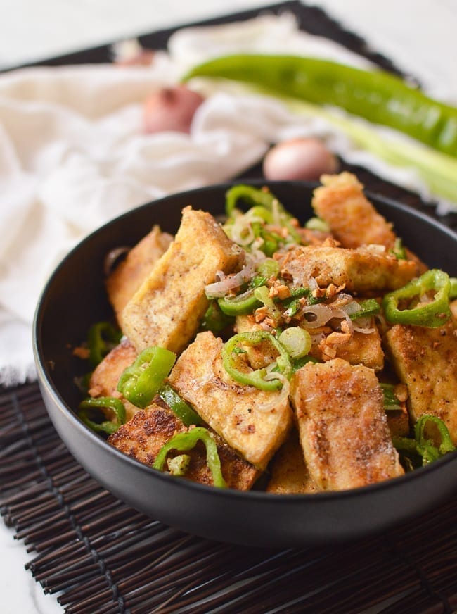 Salt and pepper tofu in black bowl, cwww5.fioekdjsdas.cf