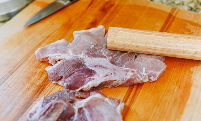 Pounding pork chops with rolling pin, cwww5.fioekdjsdas.cf