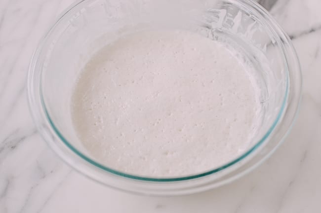 Bubbles on fermented rice flour, sugar, water, and yeast mixture, cwww5.fioekdjsdas.cf