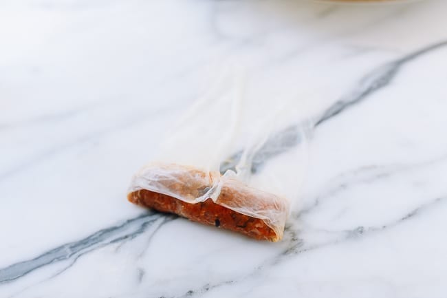 Folding sides of wrapper over filling, cwww5.fioekdjsdas.cf