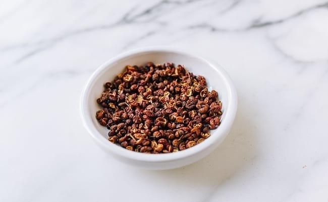 Red Sichuan Peppercorns in white dish, cwww5.fioekdjsdas.cf