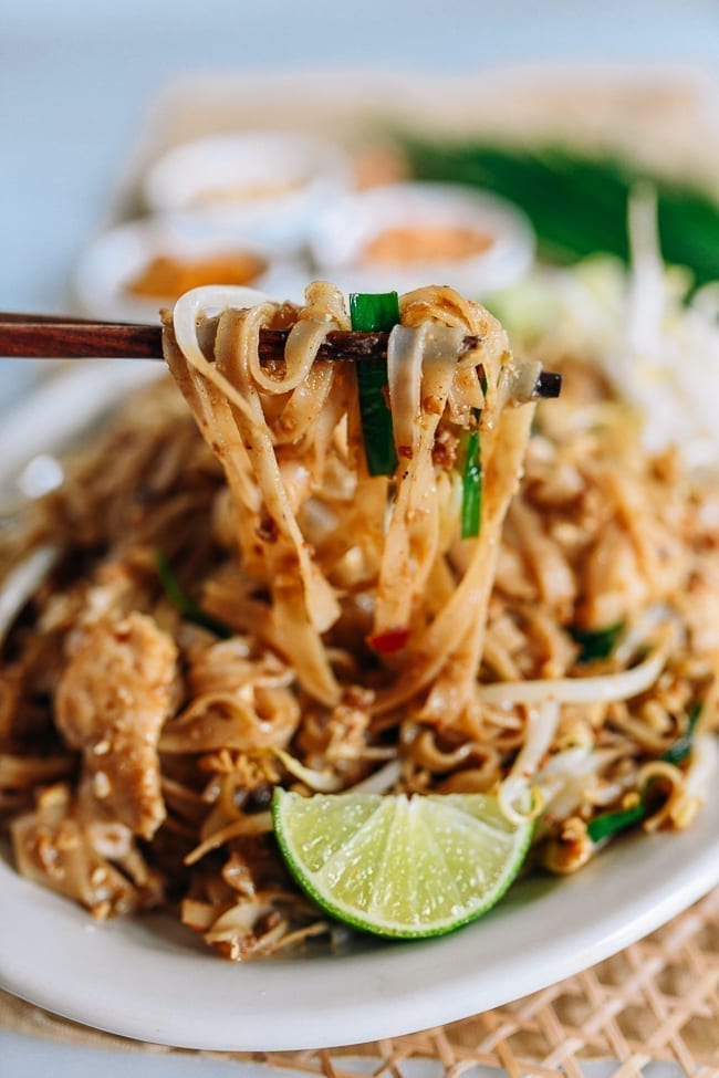 Lifting pad thai with chopsticks, cwww5.fioekdjsdas.cf