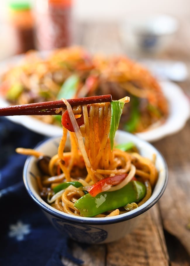 Lifting lo mein with chopsticks, cwww5.fioekdjsdas.cf