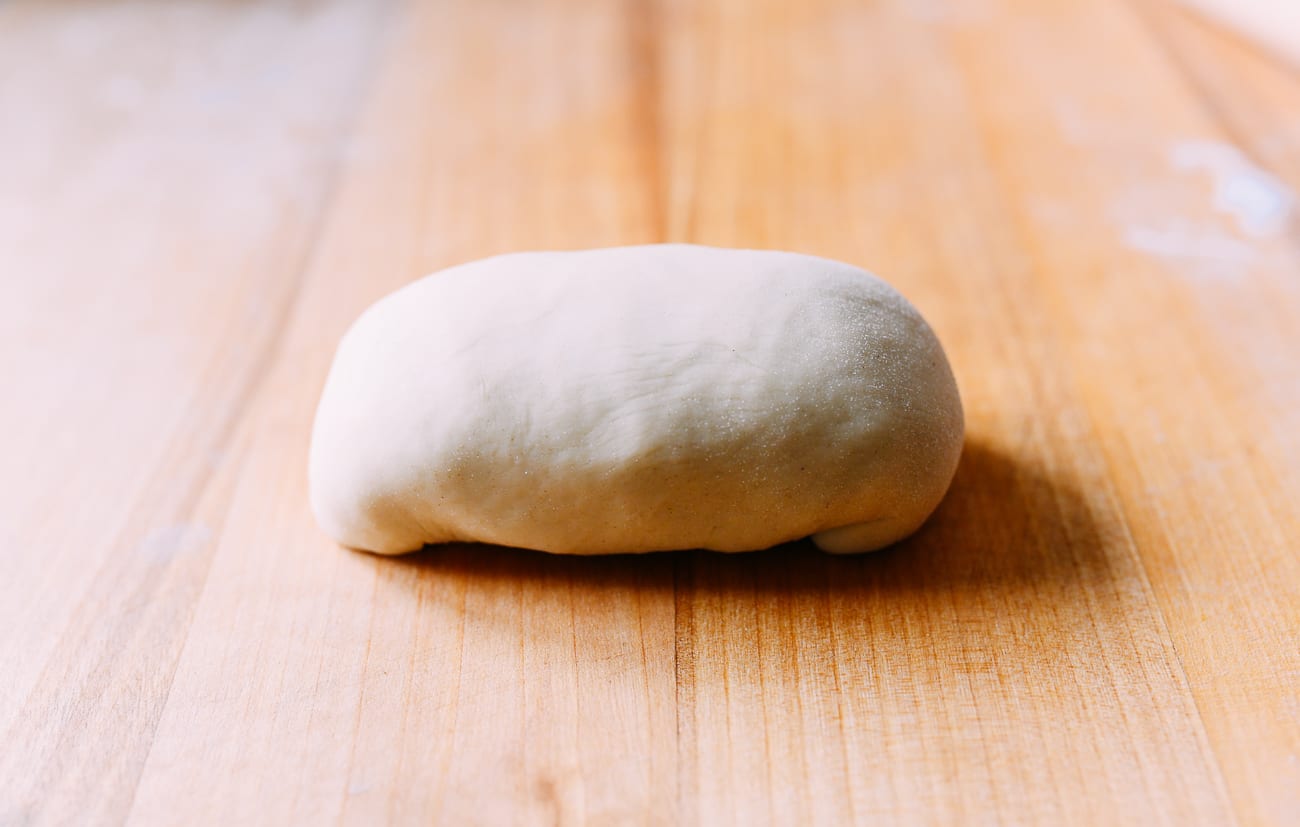 Ends tucked underneath the bun