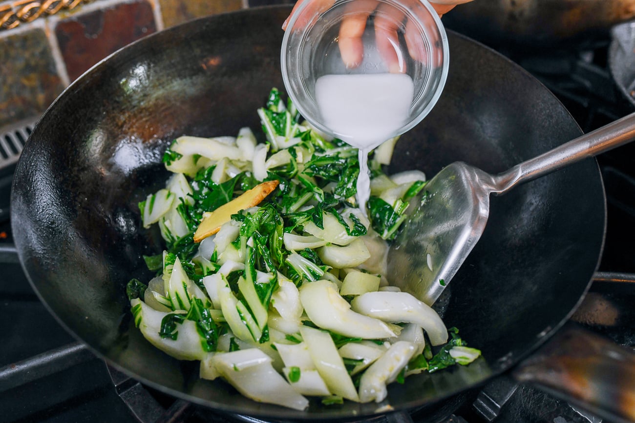 adding cornstarch slurry to bok choy