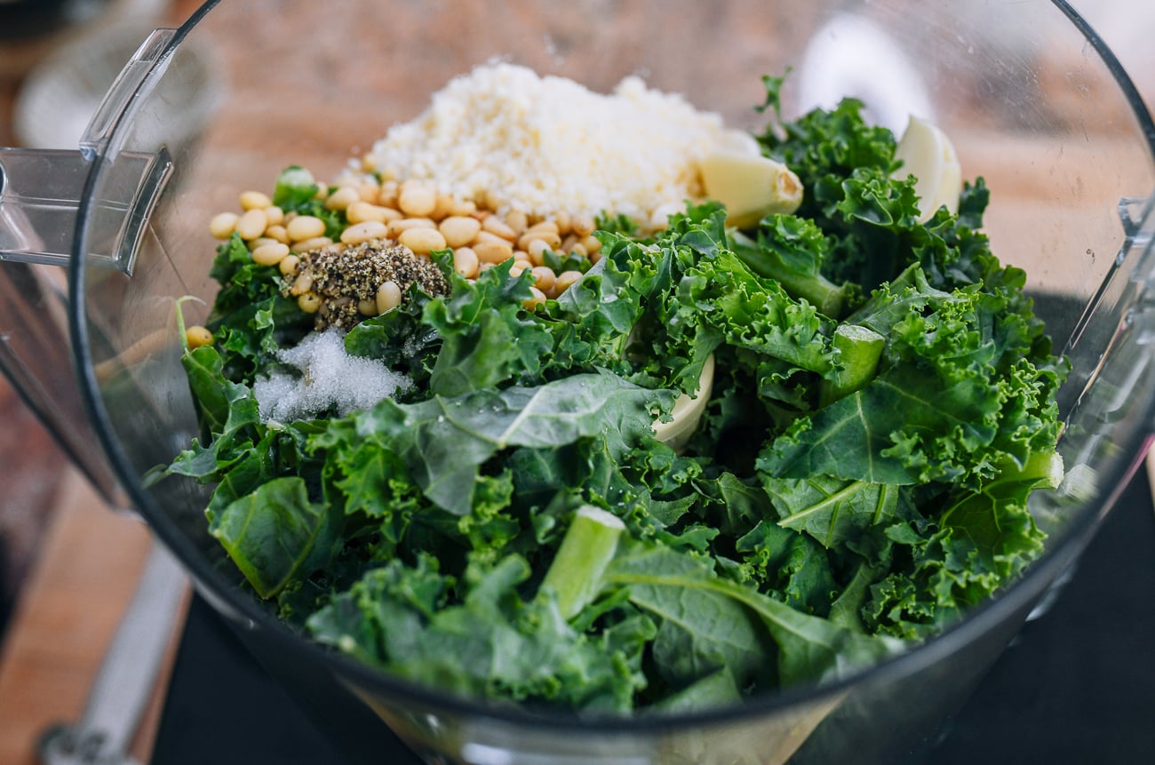 kale pesto ingredients in food processor