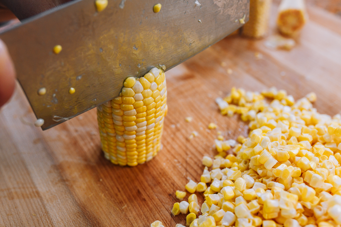 cutting corn off the cob