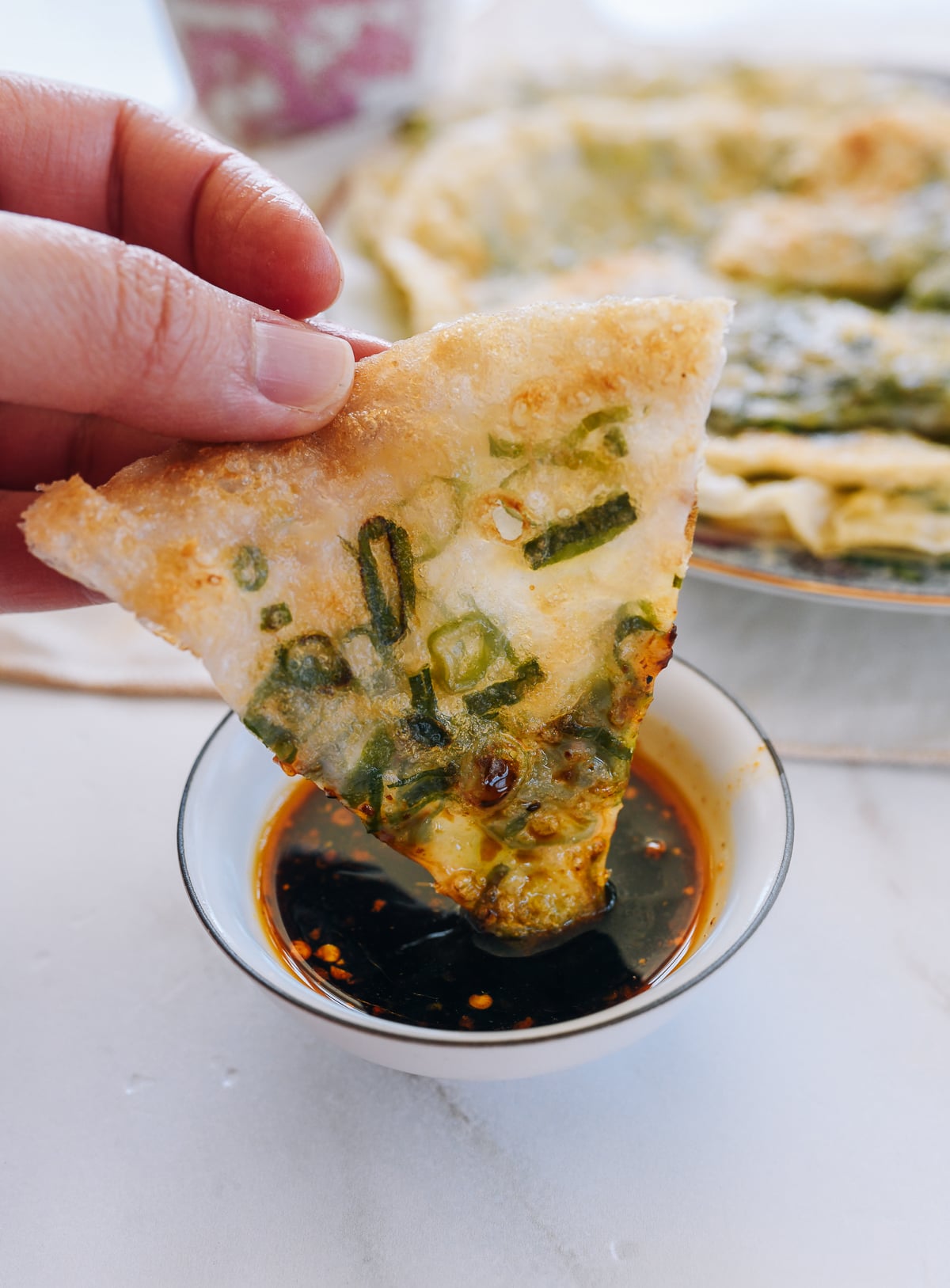 dipping gluten-free scallion pancake
