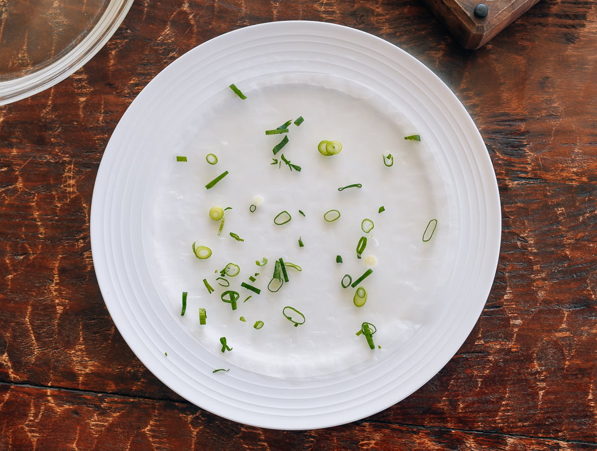 rice paper wrapper with sprinkle of chopped scallion