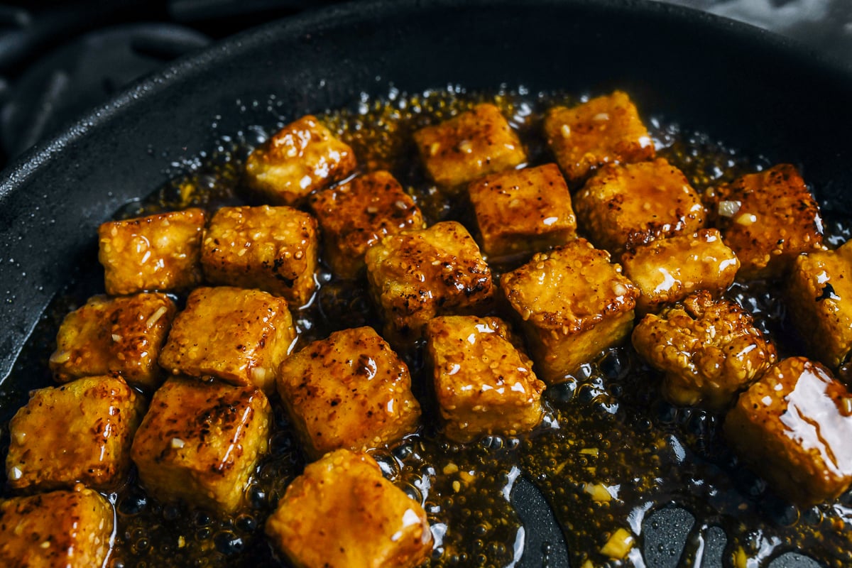 sesame tofu tossed in sauce