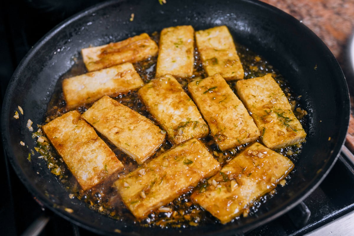 simmering tofu in sauce