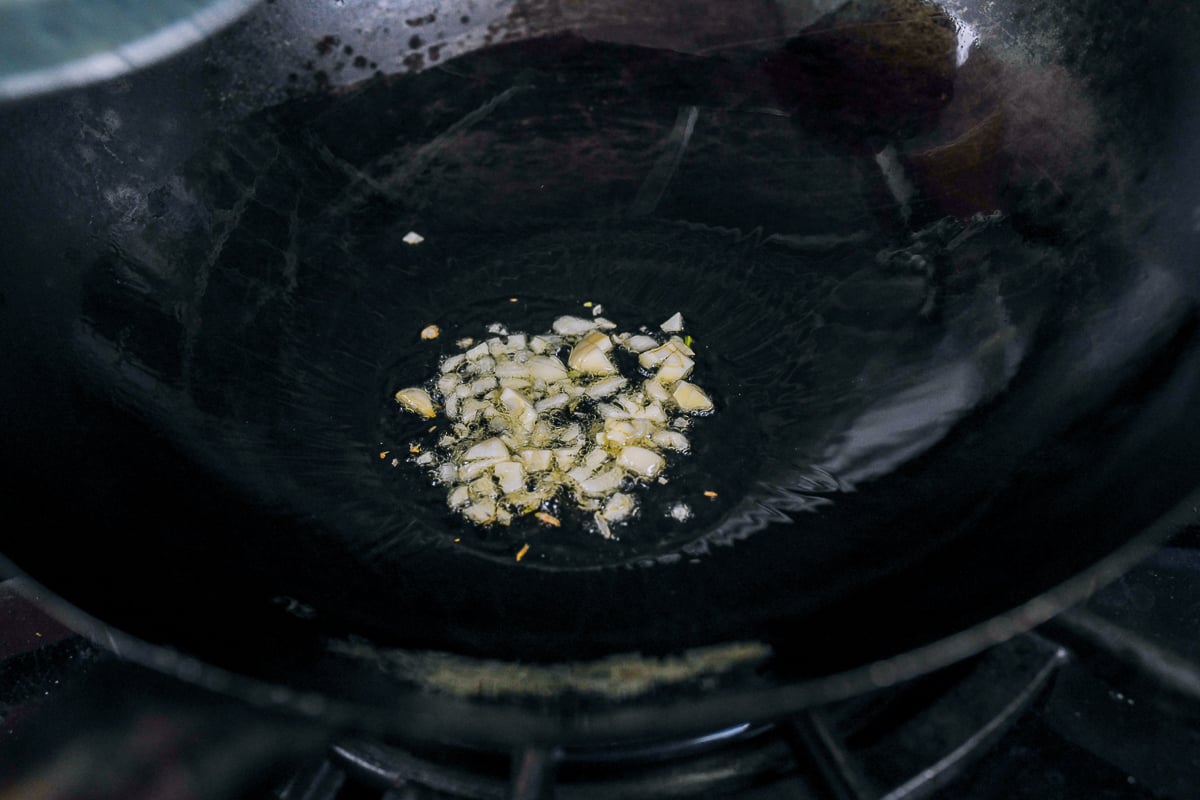 chopped garlic in wok